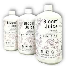 Elm Dirt Bloom Juice bottle pour supports easy feeding for lush flowering plants.