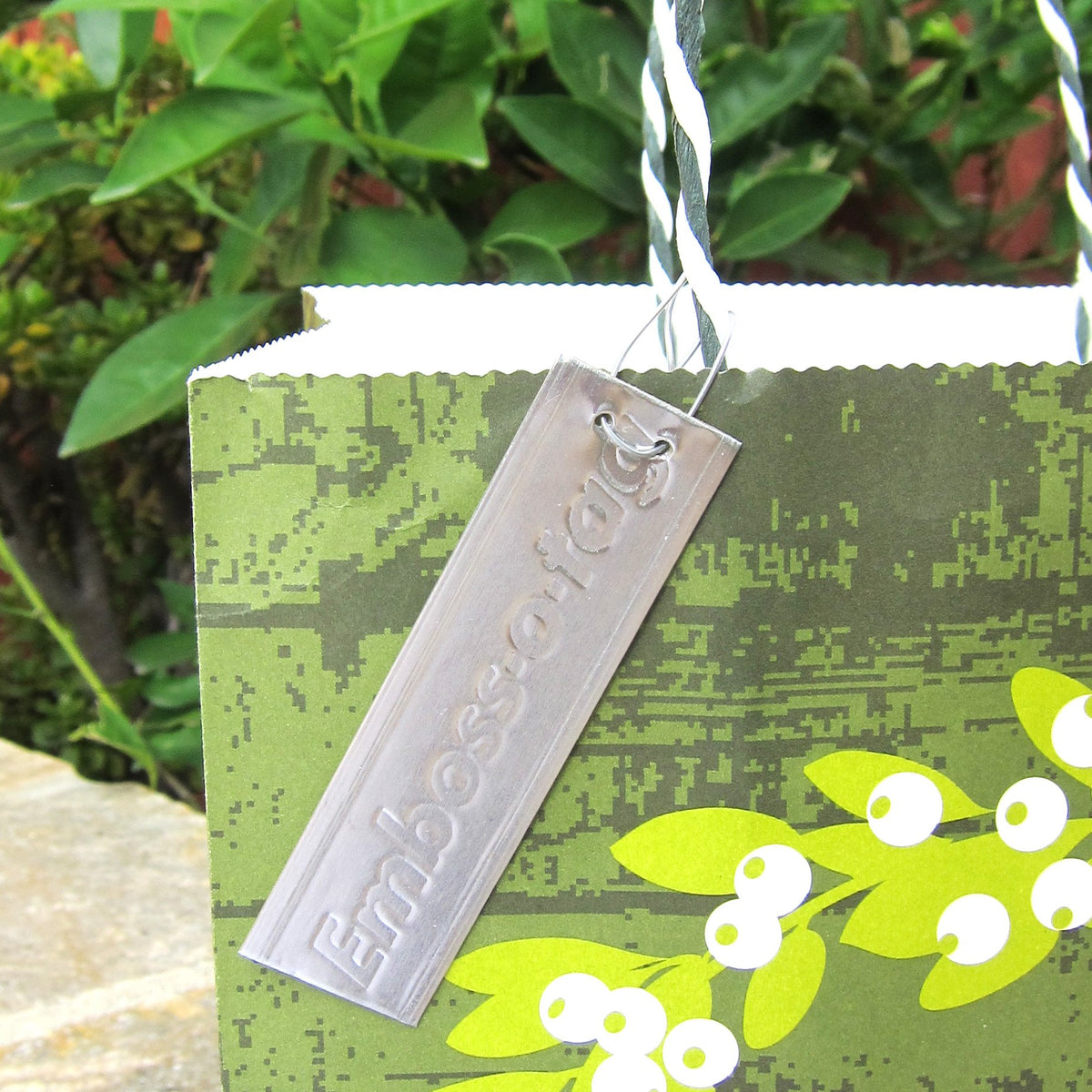 Weatherproof aluminum tag by Emboss-O-Tag for harsh conditions