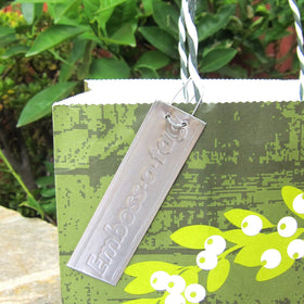 Weatherproof aluminum tag by Emboss-O-Tag for harsh conditions