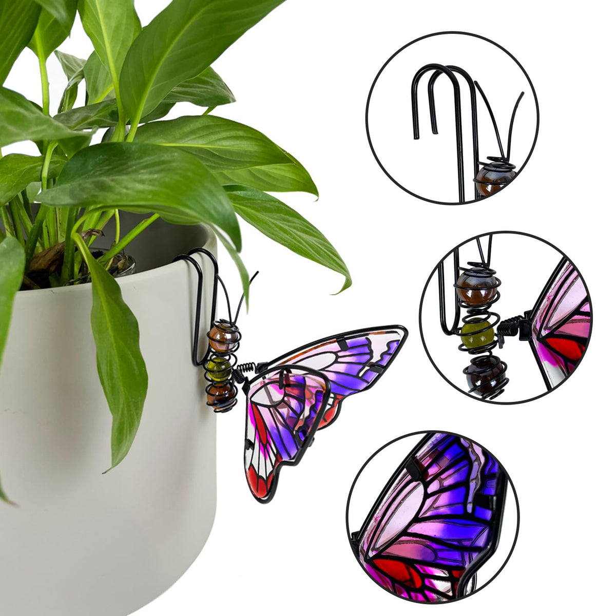 EMINGSKY iron-and-glass butterfly with hand-painted details catches sunlight.
