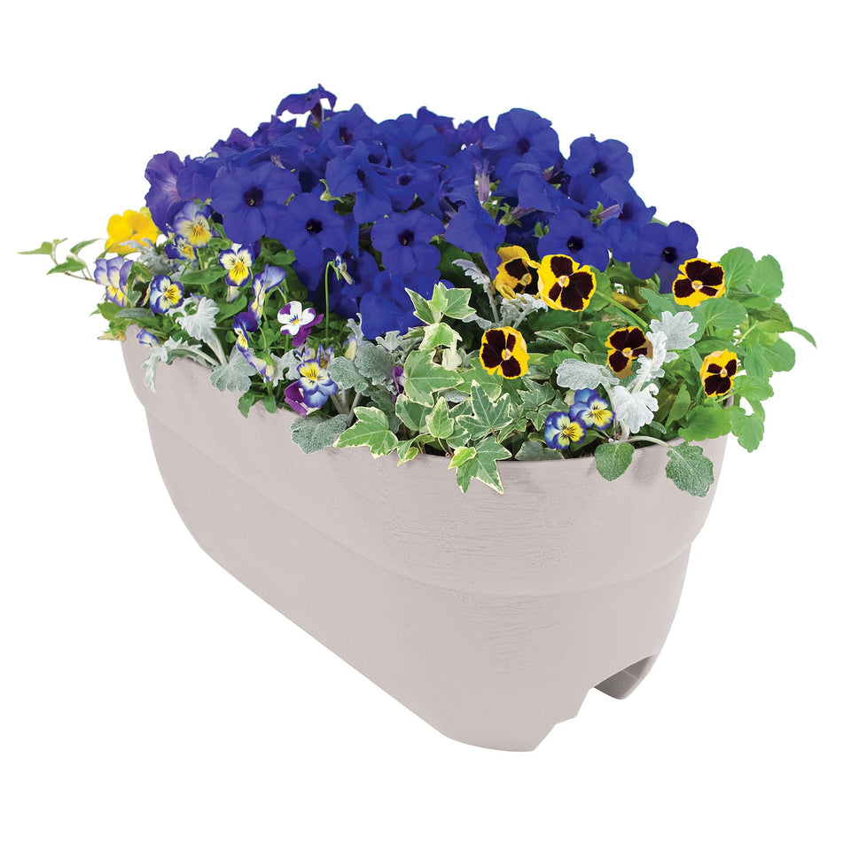 emsco bloomers rail planter installed on a deck railing for space-saving gardening.