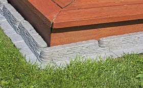 Emsco Group Bedrocks trim-free border supports mower passage.