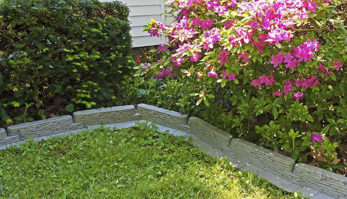 Emsco Group Bedrocks trim-free flange prevents grass encroachment along borders.