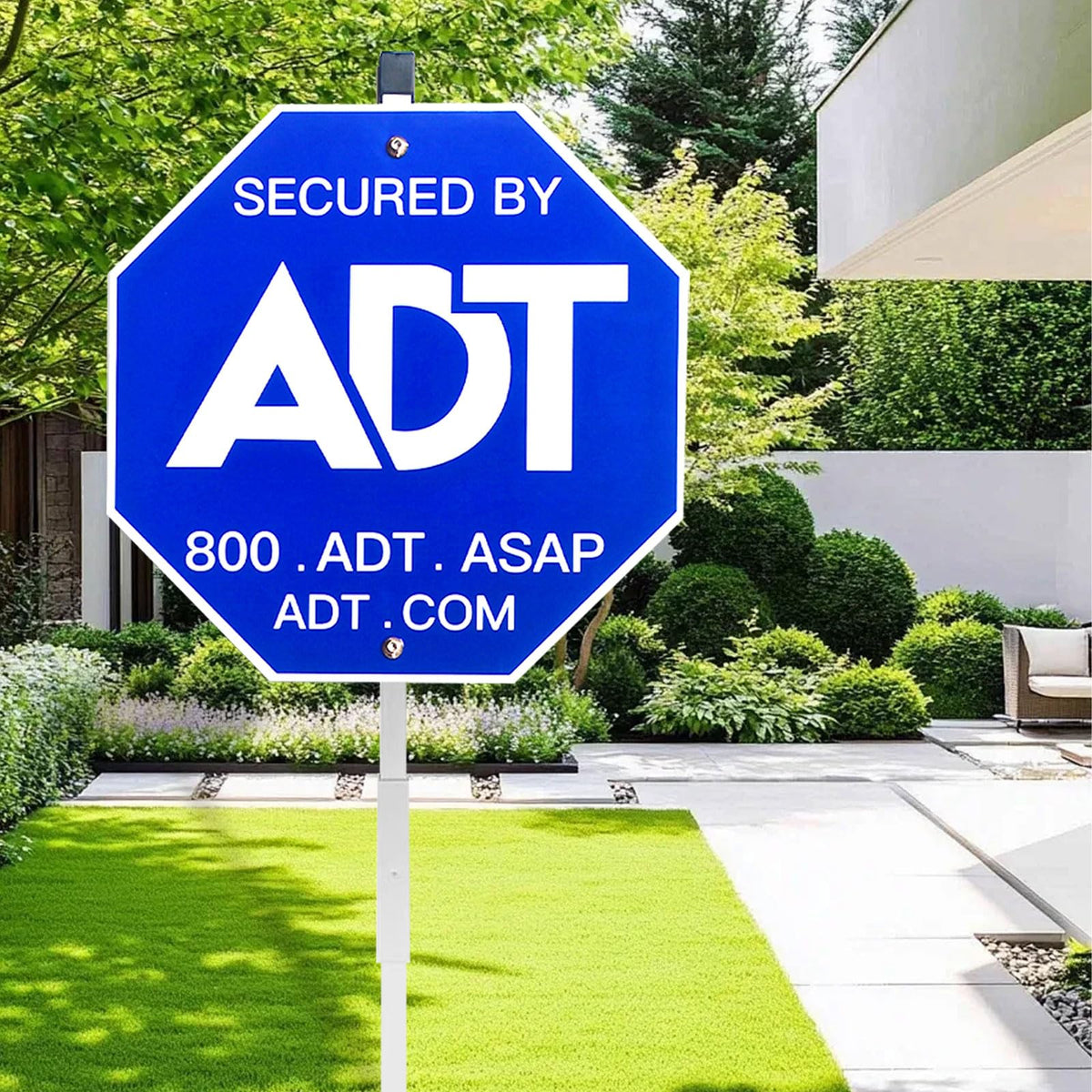 ENTINALE ADT security sign on yard stake for durable outdoor visibility.