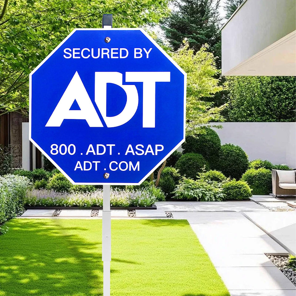 ENTINALE ADT security sign on yard stake for durable outdoor visibility.