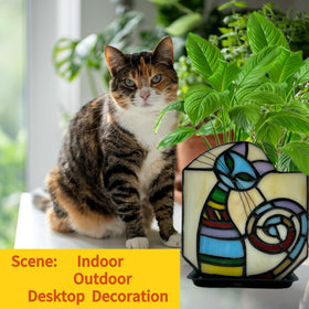Entlityful stained glass cat pot closeup; glass texture catches light beautifully