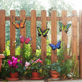 Bright colors catch sun; EOORAU butterflies bring lively yard accents.