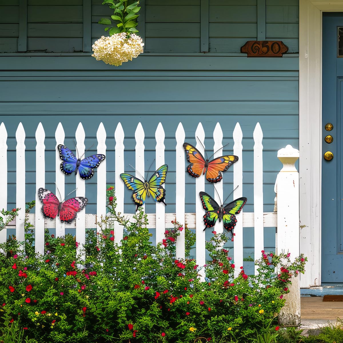 EOORAU butterflies on fence showcase vibrant garden decor and motion.