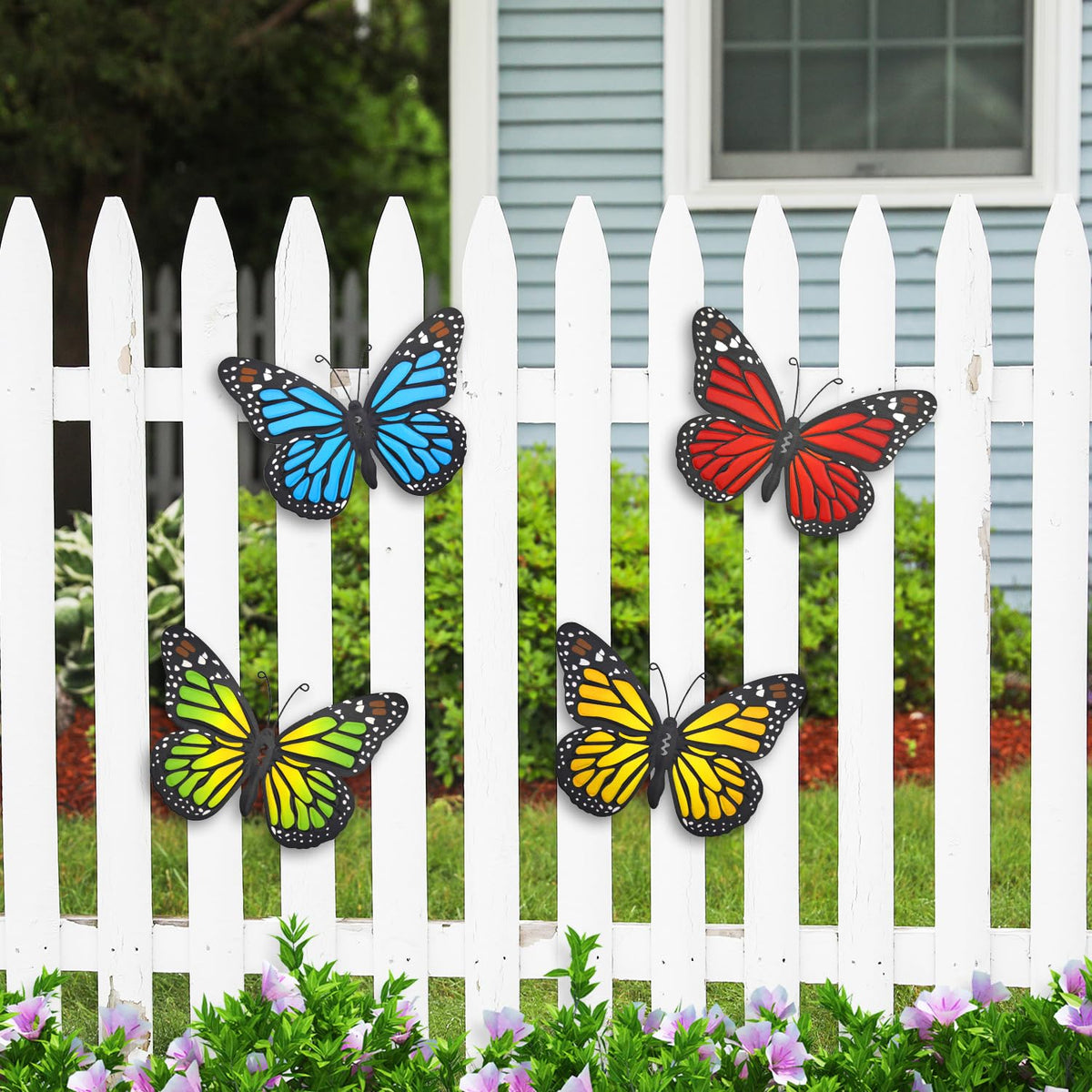 EOORAU metal butterfly wall art in green enhances garden fences with weatherproof color