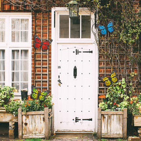 EOORAU four-pack metal butterflies offer versatile garden decoration ideas
