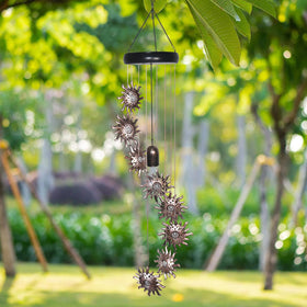 esgarden night-time glow enhances garden decor with celestial motifs
