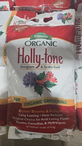 Espoma Holly-Tone fertilizer granules close-up showing natural ingredients.