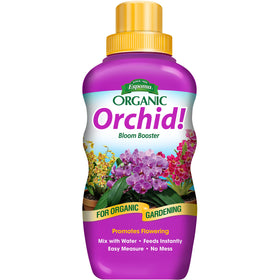 Espoma Orchid! bottle being poured for easy feeding and healthy blooms.