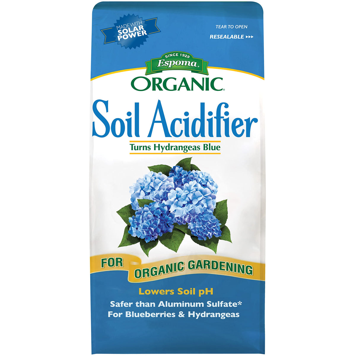 Espoma Organic Soil Acidifier pour bottle for pH adjustment and greener plants.