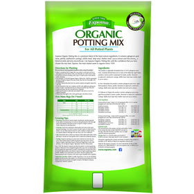 Espoma Potting Soil in container garden setup supports thriving herbs and vegetables.