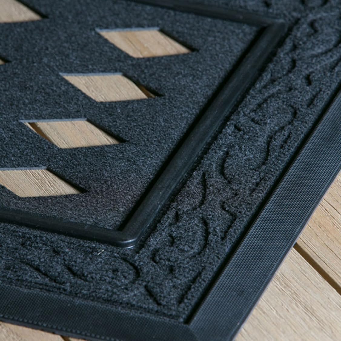 Evergreen Flag all-weather doormat tray with rubber edge withstands weather.