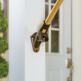 Evergreen Flag bracket heavy-duty cast-iron close-up emphasizes rugged weather resistance.