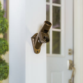 Evergreen Flag bracket wall mount illustration shows stable support for estate flags.