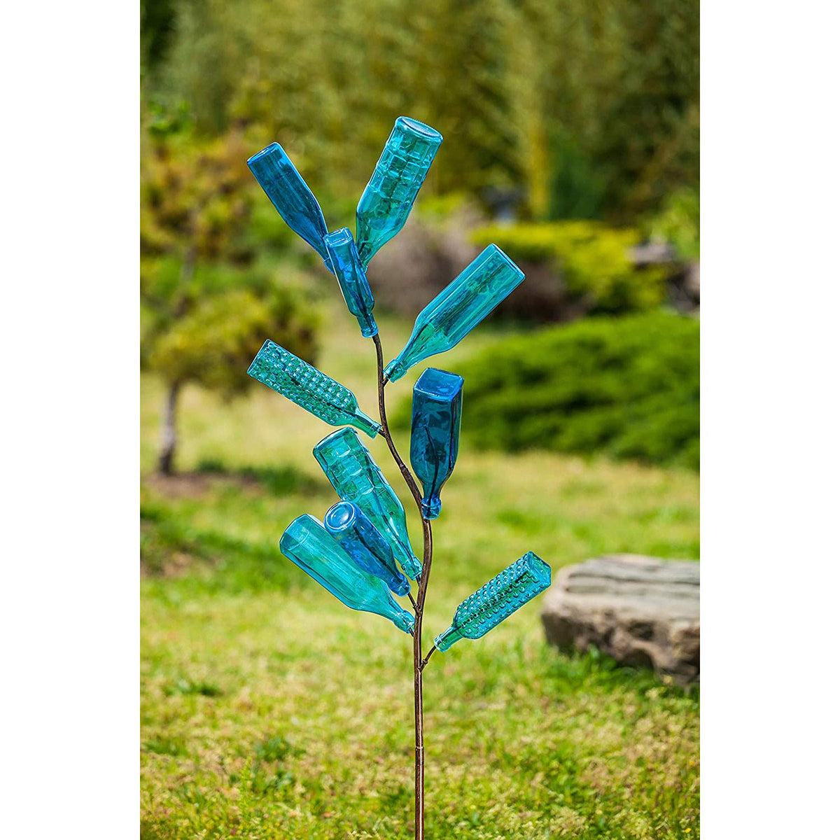 Evergreen Garden bottle tree adds seasonal flair with spring pastels or autumn hues.
