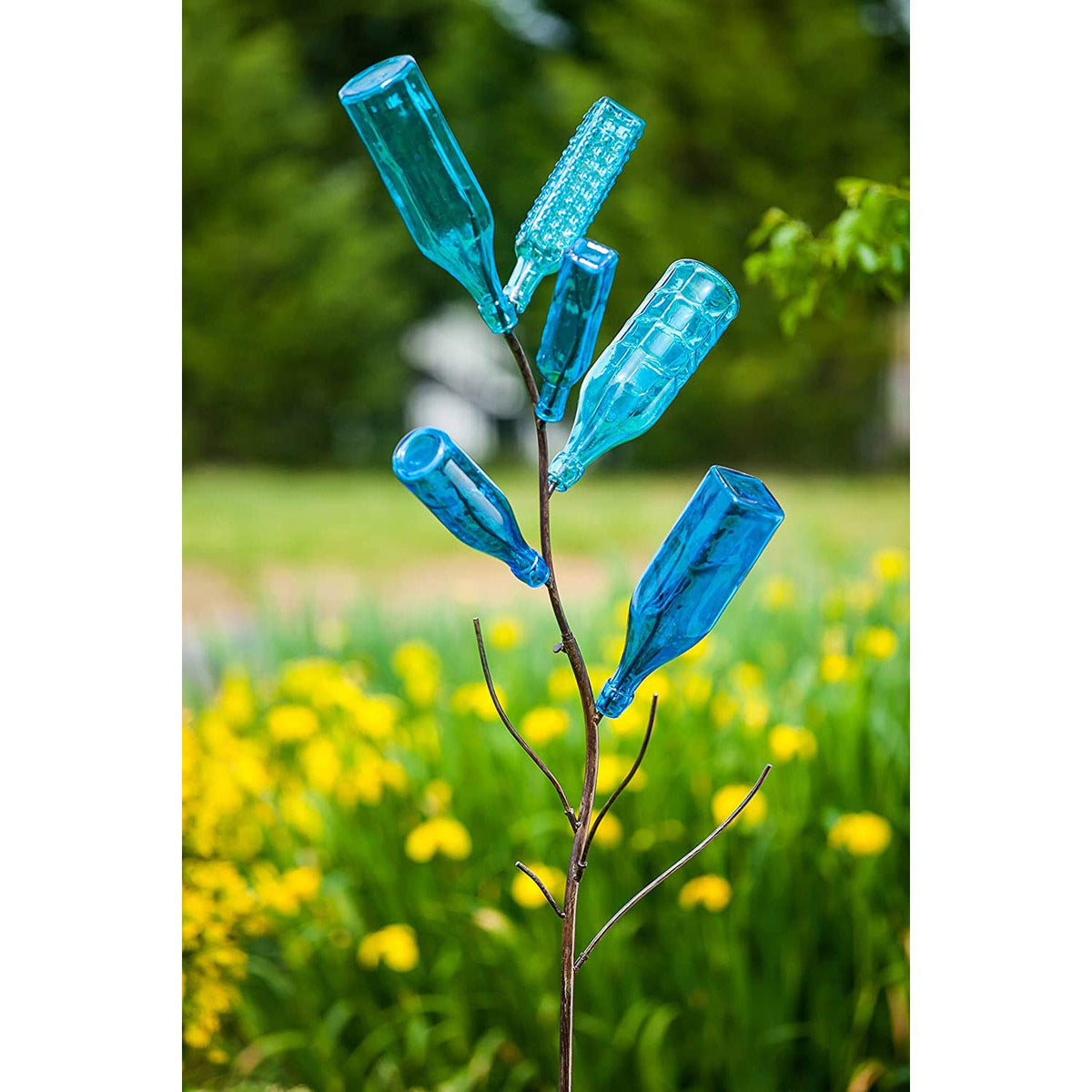 Evergreen Garden bottle tree serves as a wedding or party focal point with bottles.