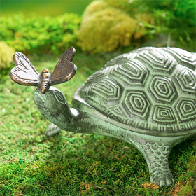 Evergreen Garden verdigris turtle-butterfly statue stands up to outdoor weather.