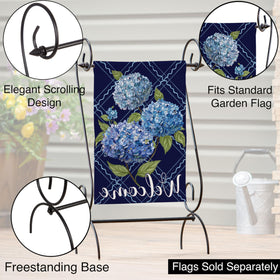 Evergreen Scroll Garden Flag Stand holding 12x18 garden flag outdoors
