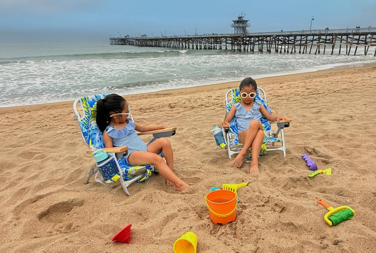 Evolve Heritage chair shown in backpack carry mode for easy hands-free transport.