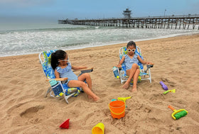 Evolve Heritage chair shown in backpack carry mode for easy hands-free transport.