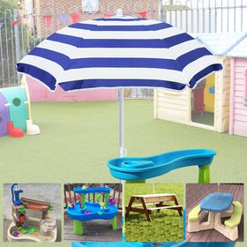 Exokugo umbrella covering picnic table keeps snacks and toys shaded during outdoor meals