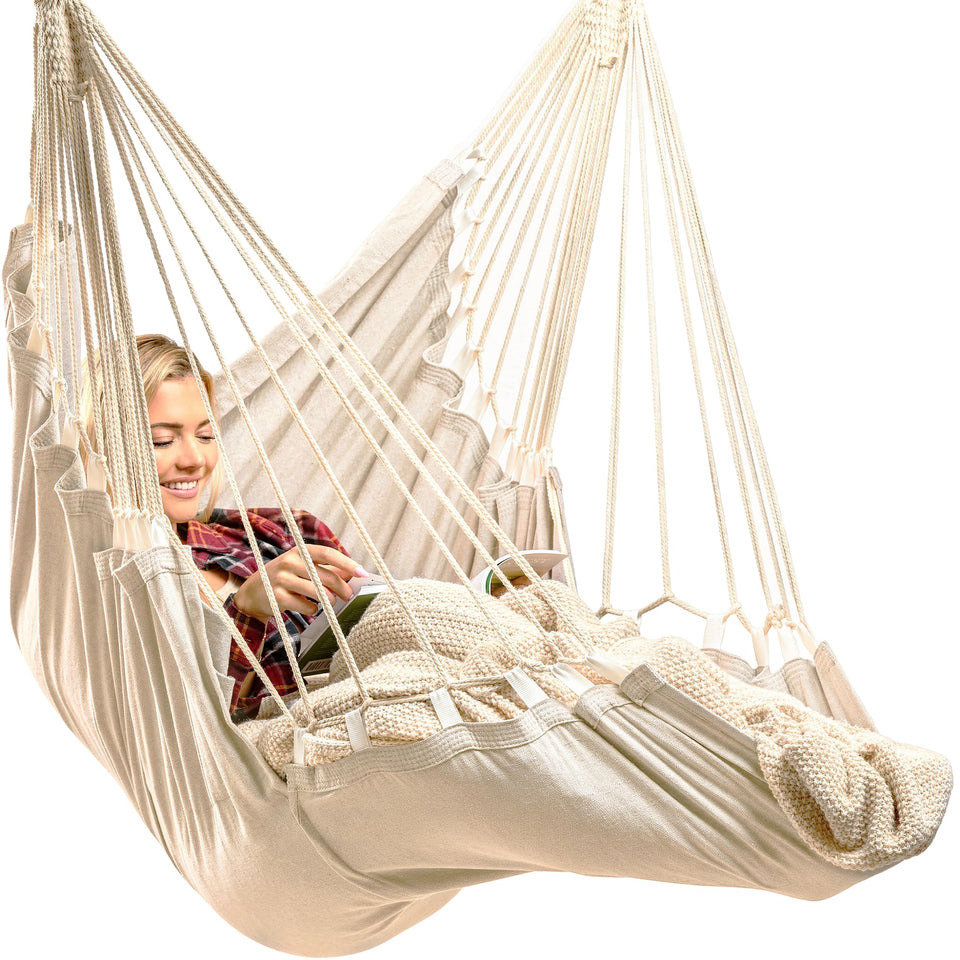 EXTIRIO Indoor Hanging Chair in a cozy bedroom provides full-body comfort.