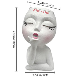 EylbKey cute head planter makes a playful gift for plant lovers.