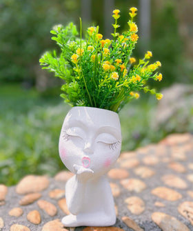 EylbKey drain-hole resin pot with removable pad for moisture control.