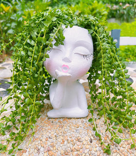 EylbKey face flower pot standing head, stylish air kiss planter for trailing plants.