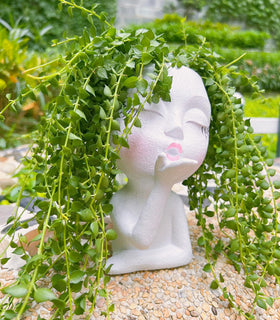 EylbKey resin planter for dangling vines, cute face pot perfect for desks.