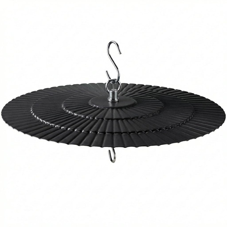 Eyrosa 11.5-inch rain guard over a bird feeder shields seeds from rain and sun.