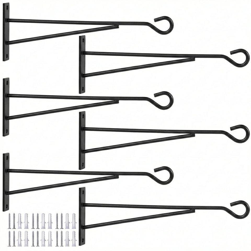 Eyrosa 8-inch hanging plant hook on a wooden fence supporting vertical greenery.