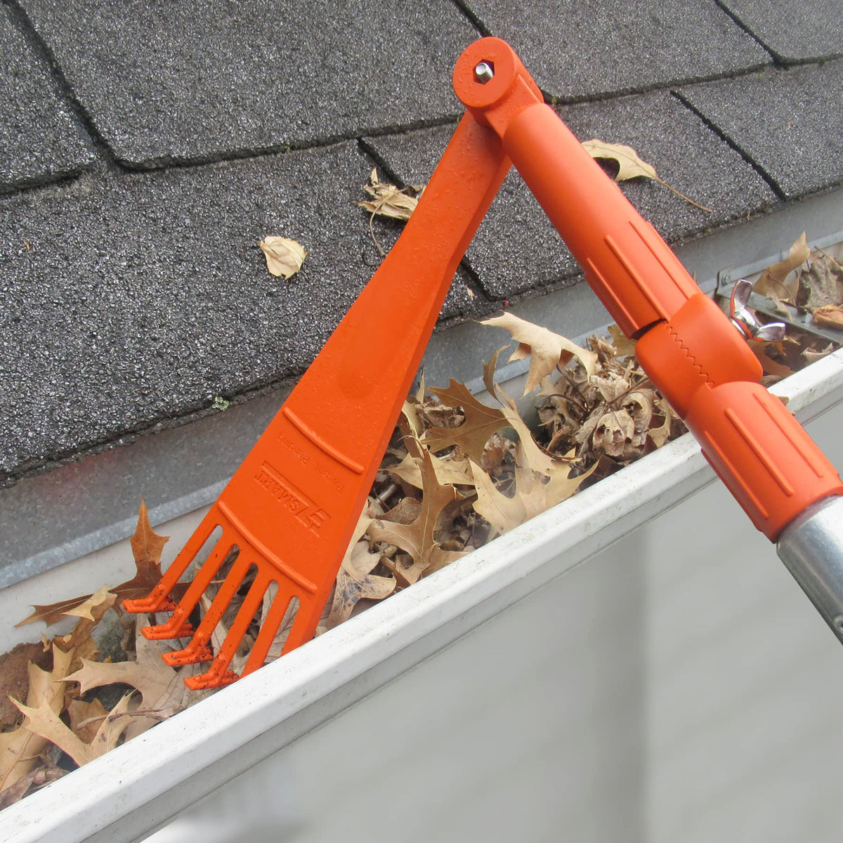 EZ SMART Mini Rake Head used for gutter cleaning from ground level, reducing ladder use.