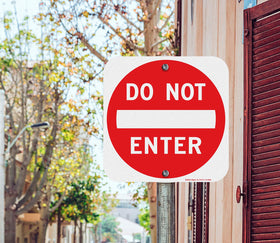 Faittoo sign uses bold white text for distance readability.