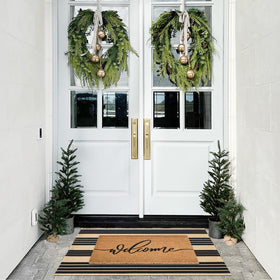 Fallovea plaid rug 28x43 enhances entryway style and space.
