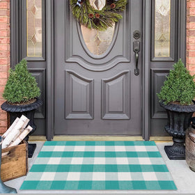 Fallovea patio rug enhances outdoor spaces with timeless plaid design