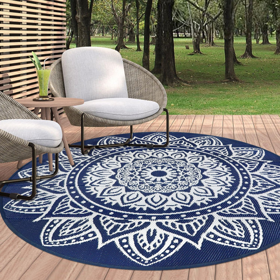 famibay 6ft round boho outdoor rug on patio; waterproof and quick-drying for outdoor use.