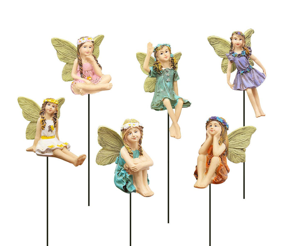 Fanwnki fairy garden figurine set in vintage resin design for outdoor decor.