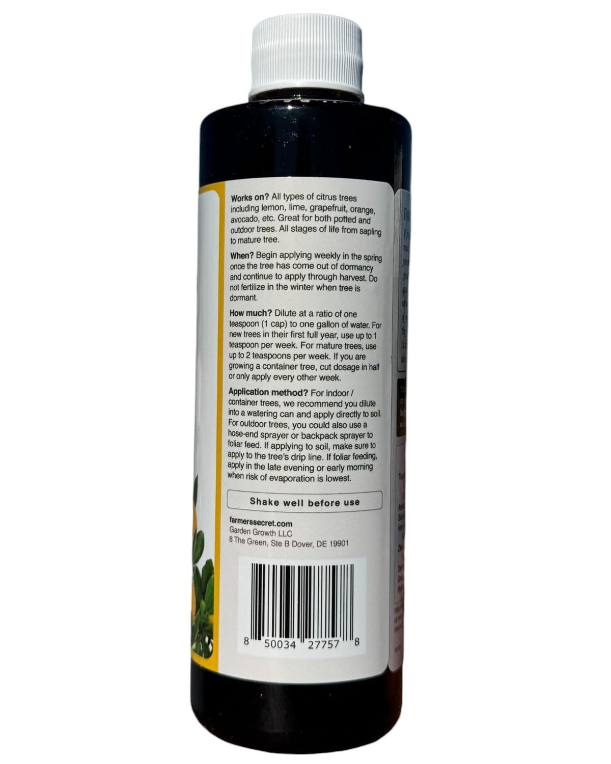 Farmer's Secret Citrus Tree Booster label shows dosing guidelines clearly.