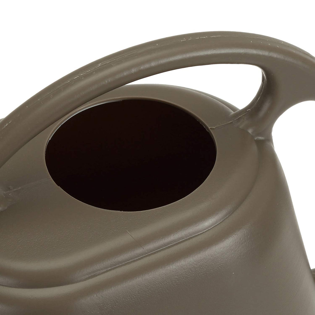 Long-spout design helps direct water to roots between foliage.