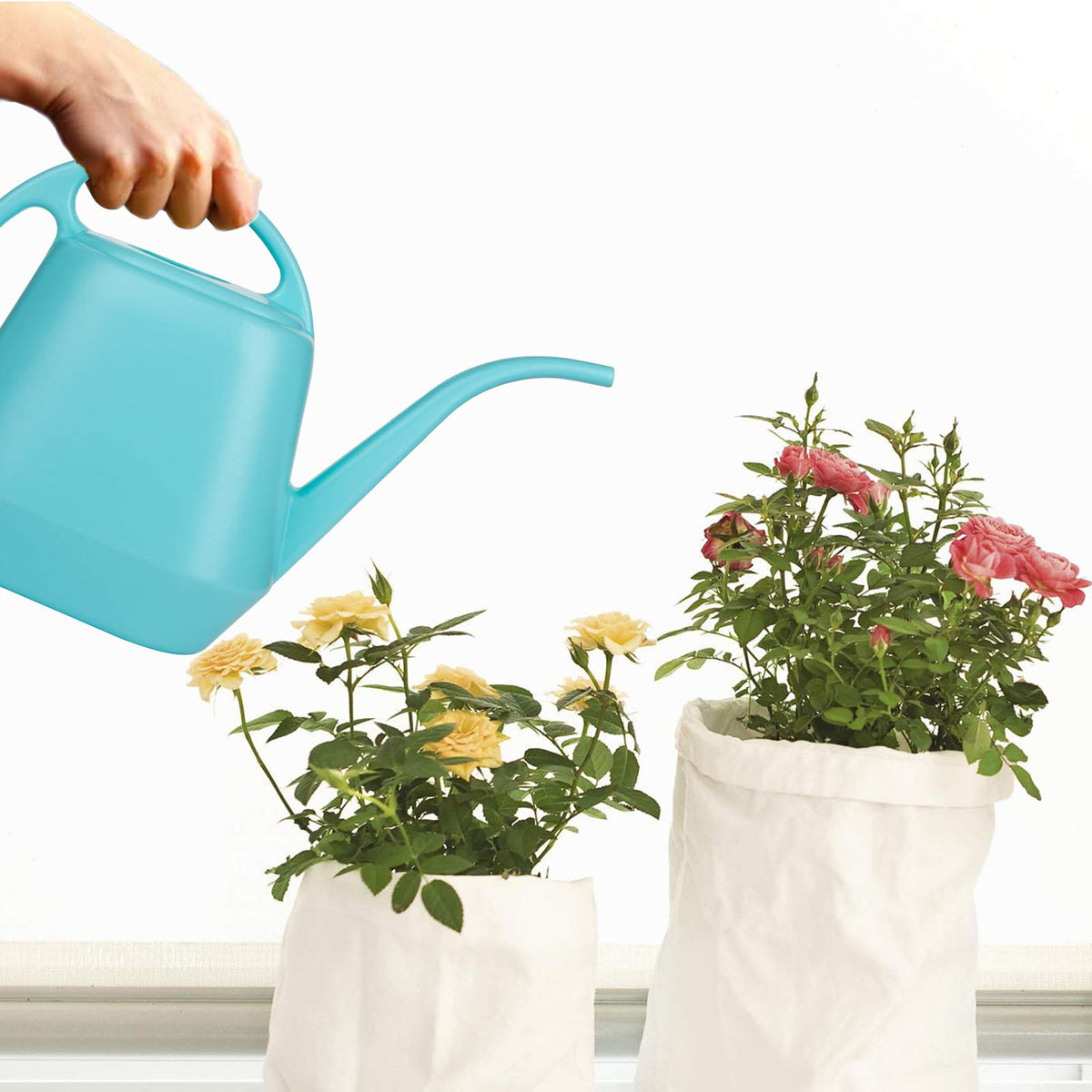Fasmov durable plastic watering can withstand daily use