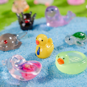 Faunamancy miniature animal figurines with glossy finish for fairy garden displays.