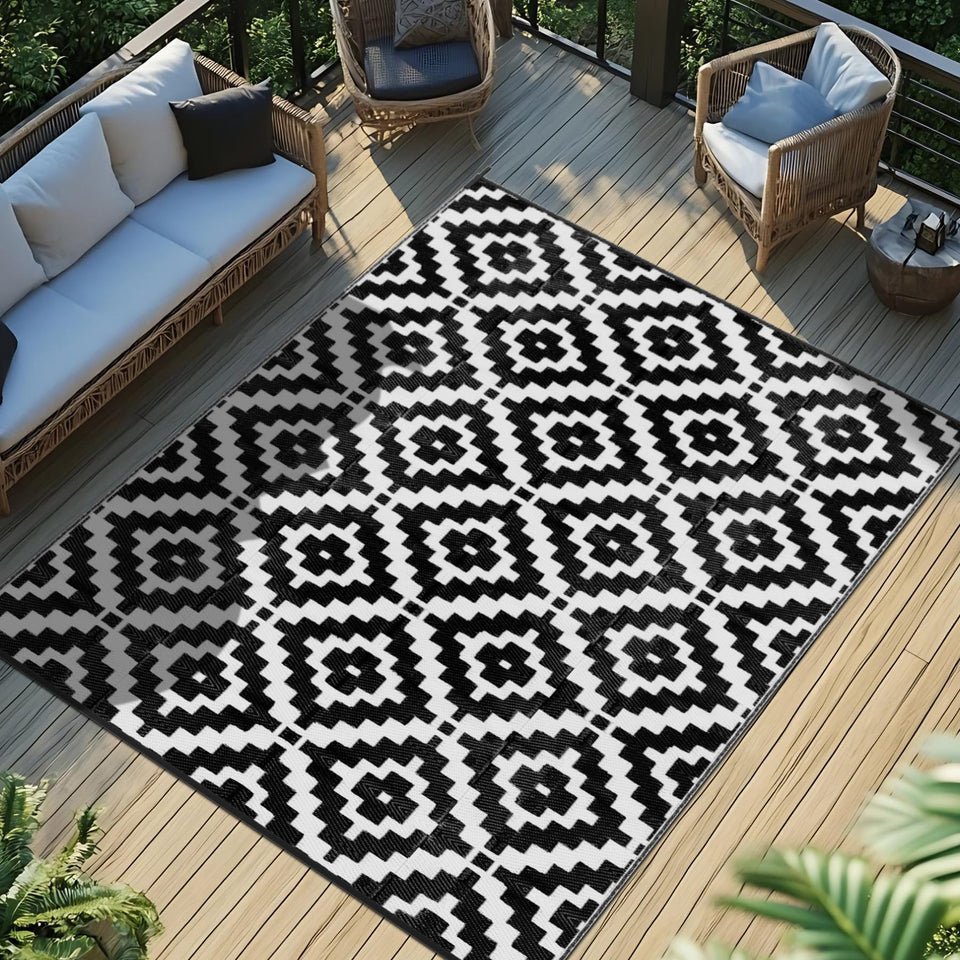 Favoyard outdoor rug 5x8 waterproof on a sunny patio for durable outdoor living.