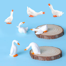 FCKLVMC mini goose figurine in a dollhouse scene with detailed texture