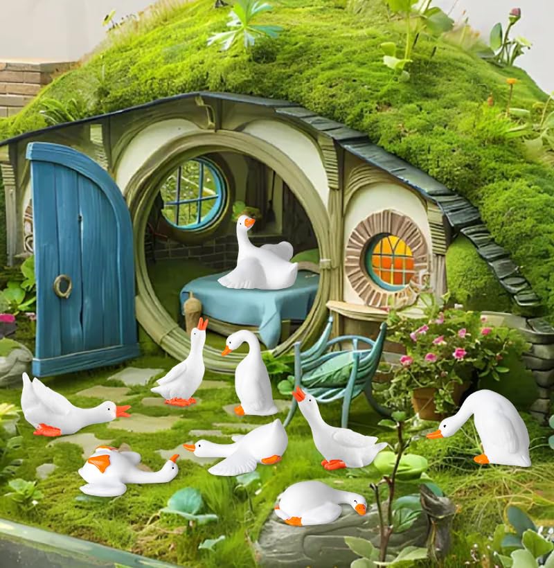 Packshot of FCKLVMC resin goose figurines in a white display layout