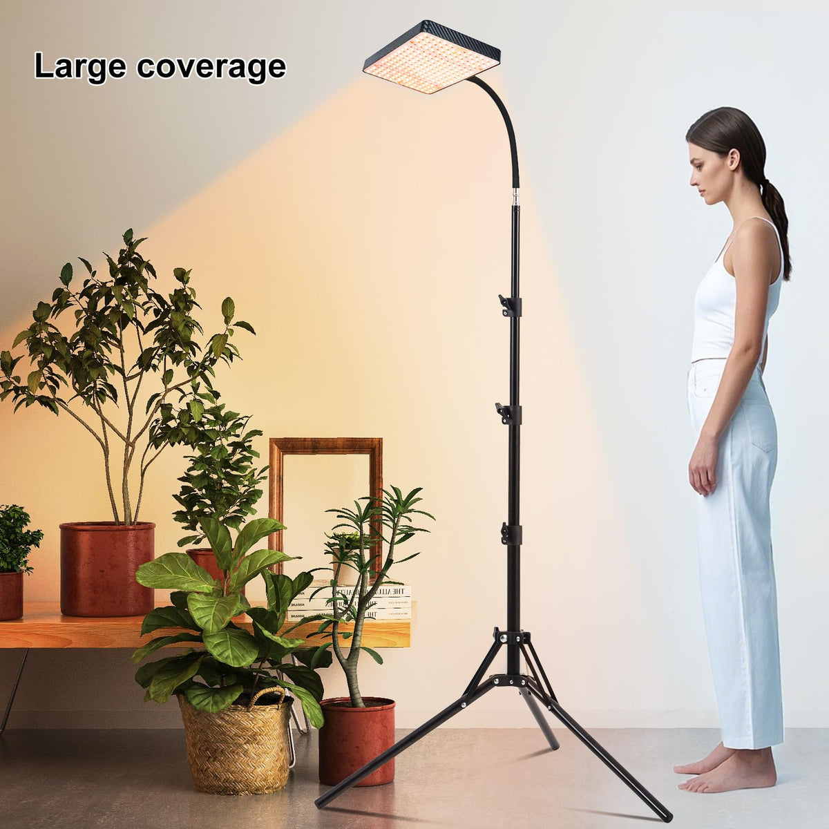 Fully extended height-adjustable stand supports tall plants with even lighting.
